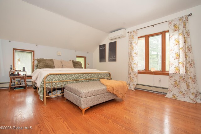 975 Riverview Rd, Schenectady, NY 12309 - bedroom featuring a baseboard heating unit, an AC wall unit, wood finished floors, and lofted ceiling