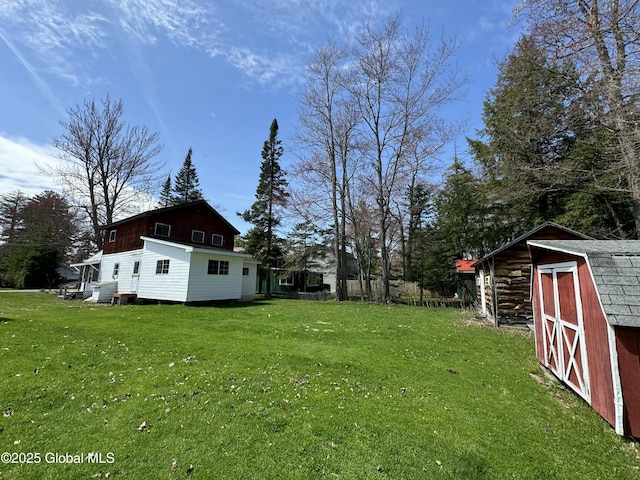113 Forest Ave, Caroga, NY 12032 - view of yard with an outbuilding and a shed