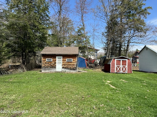 113 Forest Ave, Caroga, NY 12032 - view of yard featuring an outbuilding and a shed