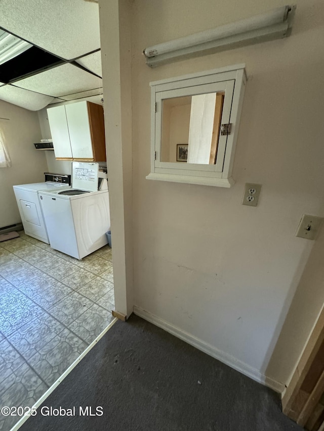 113 Forest Ave, Caroga, NY 12032 - interior space with light countertops, white cabinetry, baseboards, and washer and clothes dryer