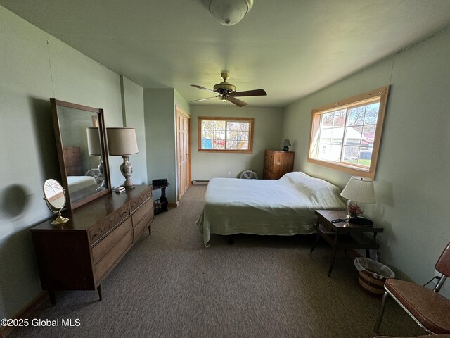 113 Forest Ave, Caroga, NY 12032 - carpeted bedroom with baseboards and ceiling fan