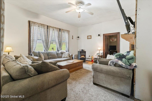 209 Lake Ave, Lake Luzerne, NY 12846 - living area with ceiling fan, baseboard heating, and carpet flooring