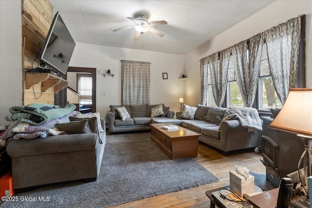 209 Lake Ave, Lake Luzerne, NY 12846 - living area featuring a ceiling fan and wood-type flooring