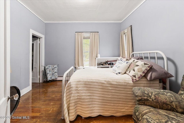 209 Lake Ave, Lake Luzerne, NY 12846 - bedroom with crown molding, dark wood finished floors, and baseboards