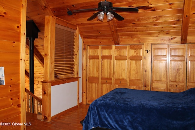 127 Fording Rd, Esperance, NY 12066 - bedroom with wooden ceiling, vaulted ceiling with beams, wood walls, and hardwood / wood-style flooring