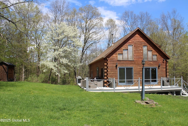 127 Fording Rd, Esperance, NY 12066 - rear view of property with a yard, a deck, and log siding