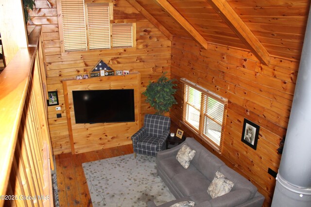 127 Fording Rd, Esperance, NY 12066 - living room featuring wood-type flooring, wood walls, vaulted ceiling with beams, and wooden ceiling