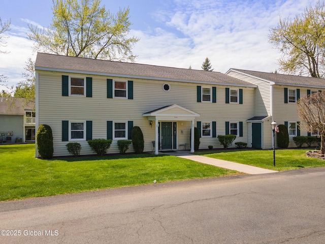 view of front of home with a front lawn
