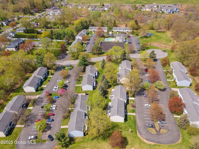 birds eye view of property with a residential view