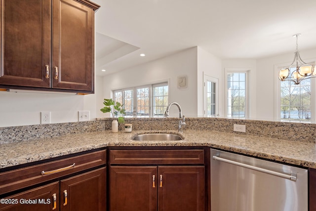 3 Riverside Ct, Stillwater, NY 12170 - kitchen with light stone countertops, a healthy amount of sunlight, a sink, and dishwasher