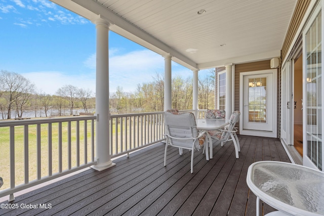 3 Riverside Ct, Stillwater, NY 12170 - wooden deck featuring a water view, outdoor dining area, and a lawn