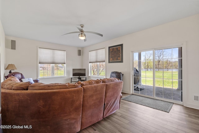 3 Riverside Ct, Stillwater, NY 12170 - living area featuring ceiling fan, visible vents, plenty of natural light, and wood finished floors
