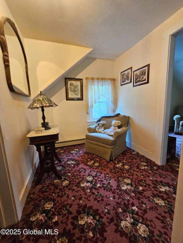 living area featuring carpet floors, baseboards, and baseboard heating