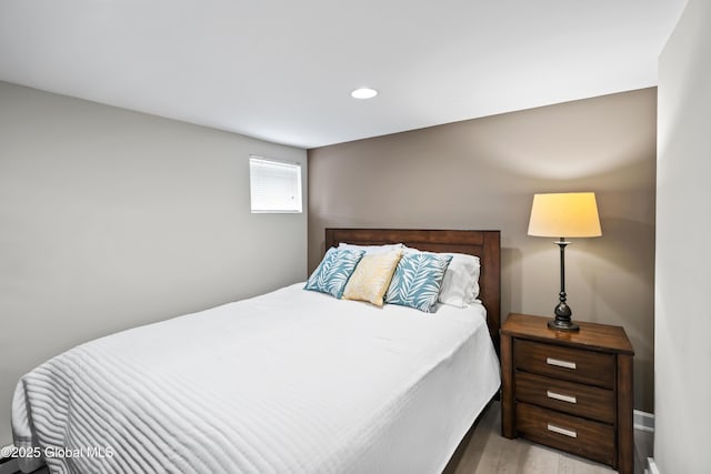 bedroom featuring recessed lighting and light wood-type flooring
