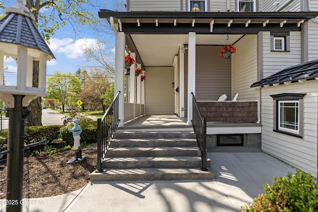 entrance to property with a porch