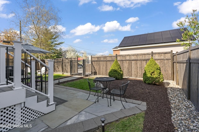 view of patio with a fenced backyard