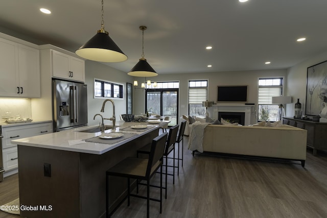 7 Magnolia Dr, Halfmoon, NY 12065 - kitchen featuring recessed lighting, dark wood finished floors, a sink, and high end refrigerator