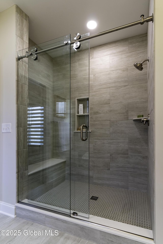 7 Magnolia Dr, Halfmoon, NY 12065 - bathroom with a stall shower and baseboards