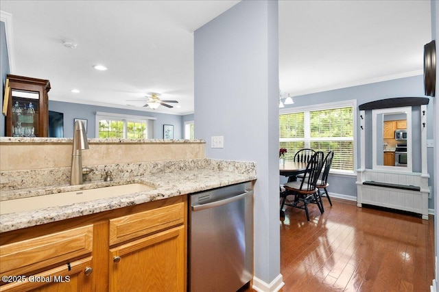 51 Treasures Pl, Queensbury, NY 12804 - kitchen with a ceiling fan, dark wood finished floors, a sink, crown molding, and appliances with stainless steel finishes