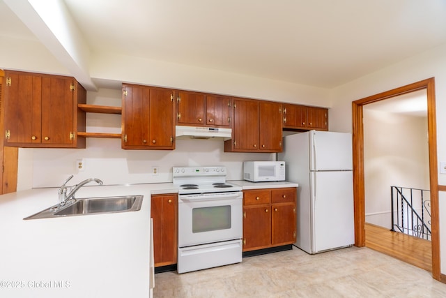27 Patricia Ln, Saratoga Springs, Inside, NY 12866 - kitchen with white appliances, a sink, under cabinet range hood, open shelves, and light countertops