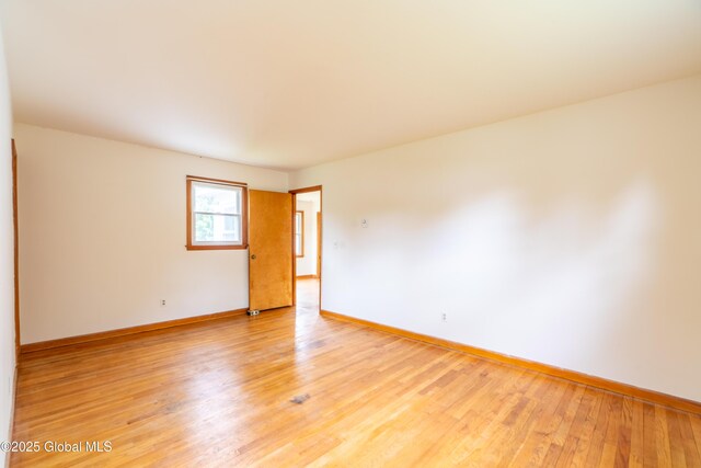 27 Patricia Ln, Saratoga Springs, Inside, NY 12866 - unfurnished room featuring baseboards and light wood-style flooring