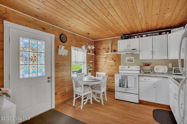 kitchen with under cabinet range hood, white electric range, wood ceiling, and plenty of natural light