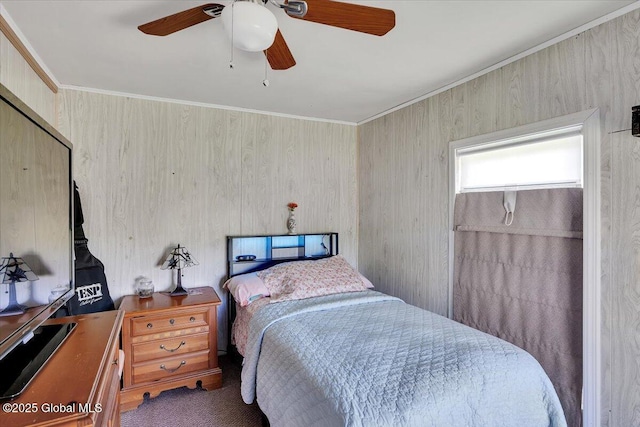 bedroom with crown molding and a ceiling fan