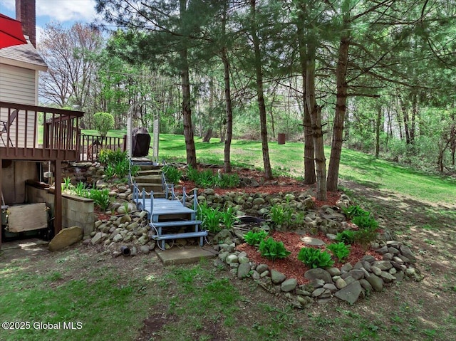 view of yard with a wooden deck