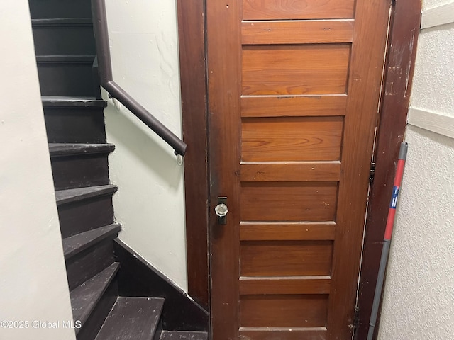 stairs with a textured wall