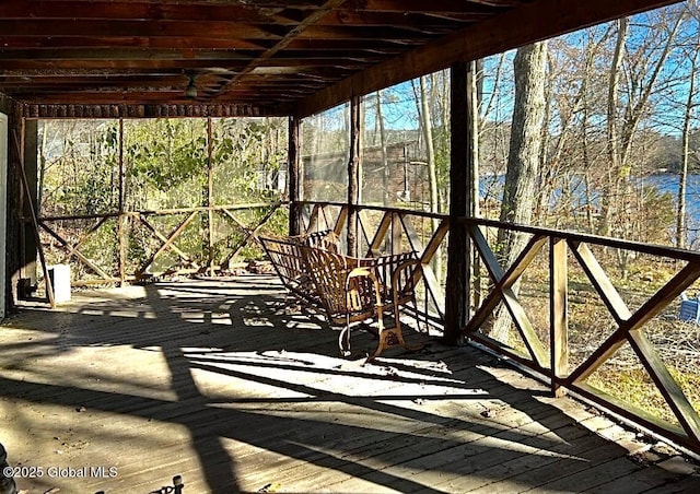 deck featuring a water view