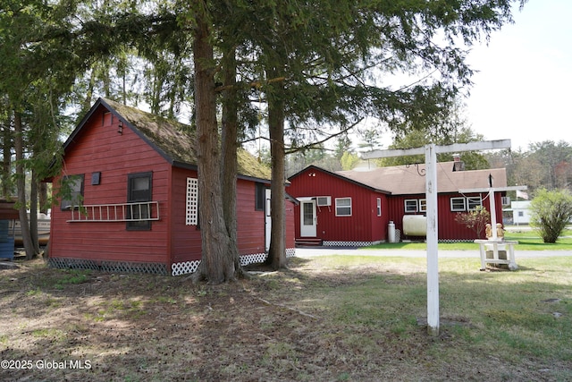 6222 Rte 9n, Hadley, NY 12835 - rear view of house featuring entry steps and a yard