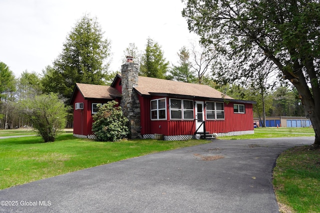6222 Rte 9n, Hadley, NY 12835 - view of front of property featuring entry steps, asphalt driveway, a chimney, and a front lawn