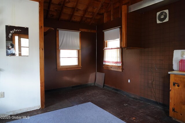 6222 Rte 9n, Hadley, NY 12835 - empty room with lofted ceiling