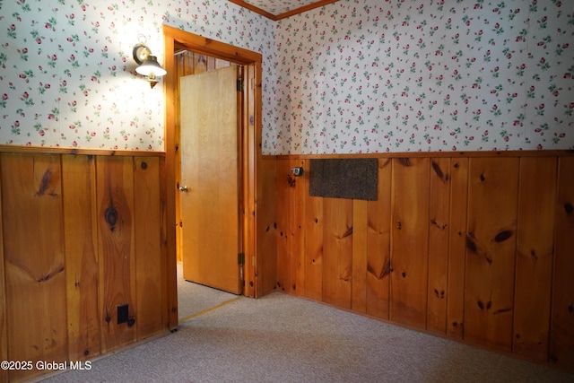 6222 Rte 9n, Hadley, NY 12835 - bathroom featuring wallpapered walls, a wainscoted wall, and ornamental molding