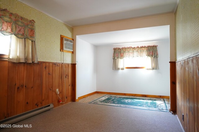 6222 Rte 9n, Hadley, NY 12835 - carpeted spare room with a baseboard heating unit, a wall mounted air conditioner, crown molding, a wainscoted wall, and wooden walls