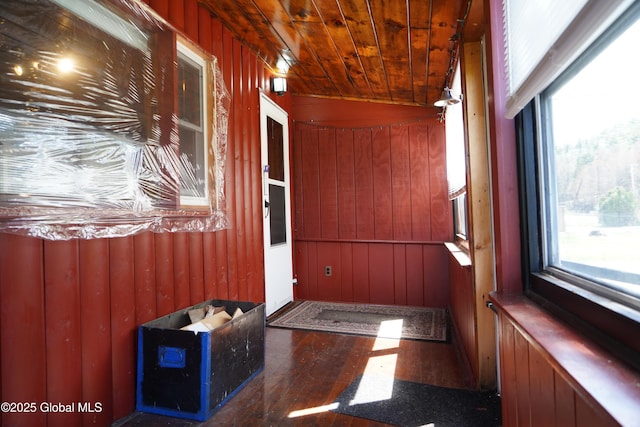 6222 Rte 9n, Hadley, NY 12835 - hallway featuring wood walls, wooden ceiling, and wood finished floors