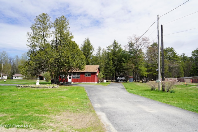 6222 Rte 9n, Hadley, NY 12835 - view of front facade featuring asphalt driveway and a front lawn