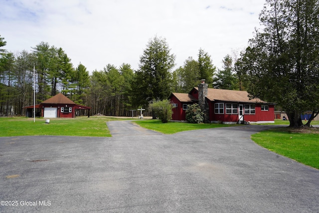 6222 Rte 9n, Hadley, NY 12835 - view of asphalt driveway with view of scattered trees