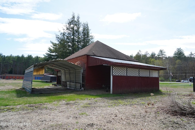 6222 Rte 9n, Hadley, NY 12835 - view of outdoor structure with a carport