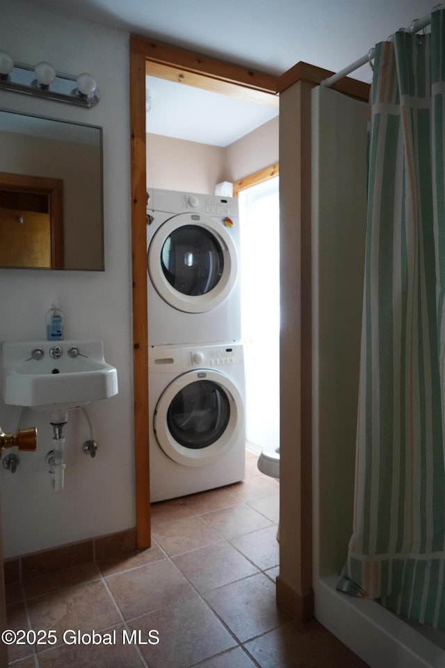 6222 Rte 9n, Hadley, NY 12835 - washroom with stacked washer / drying machine and baseboards