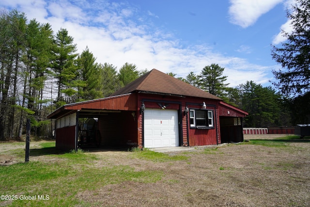 6222 Rte 9n, Hadley, NY 12835 - garage with a detached garage and dirt driveway