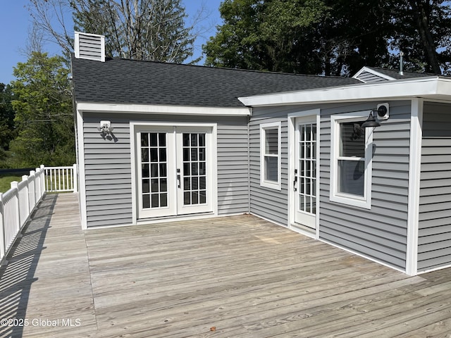 wooden deck featuring french doors
