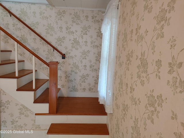 stairway with crown molding