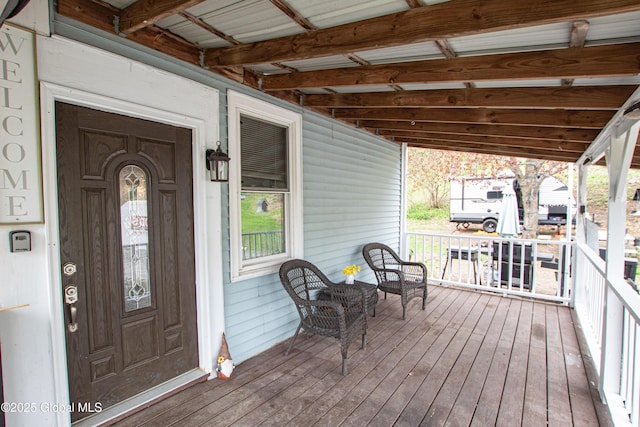 wooden deck featuring a porch