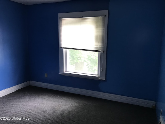 23 Orville St, Glens Falls, NY 12801 - carpeted empty room with baseboards