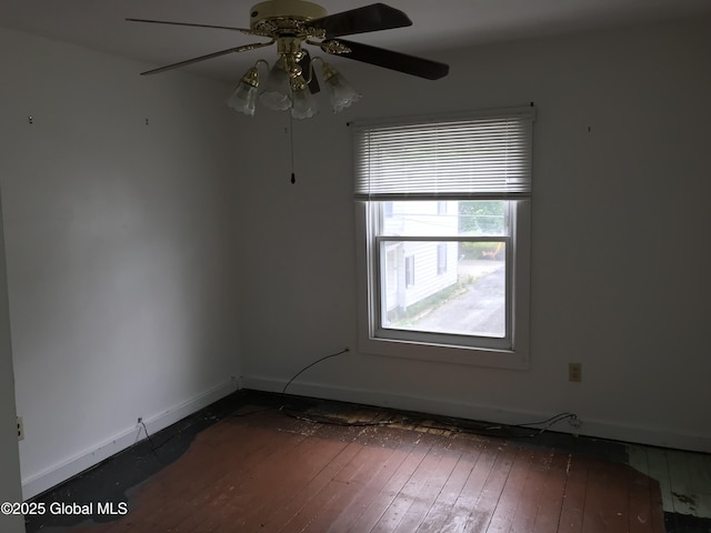 23 Orville St, Glens Falls, NY 12801 - empty room with wood-type flooring, baseboards, and ceiling fan