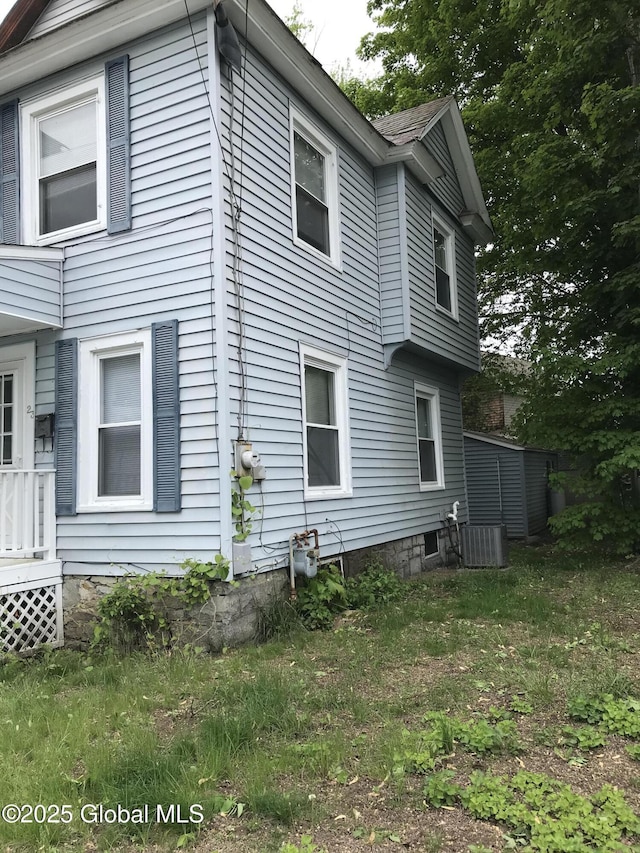 23 Orville St, Glens Falls, NY 12801 - view of side of home with central AC unit