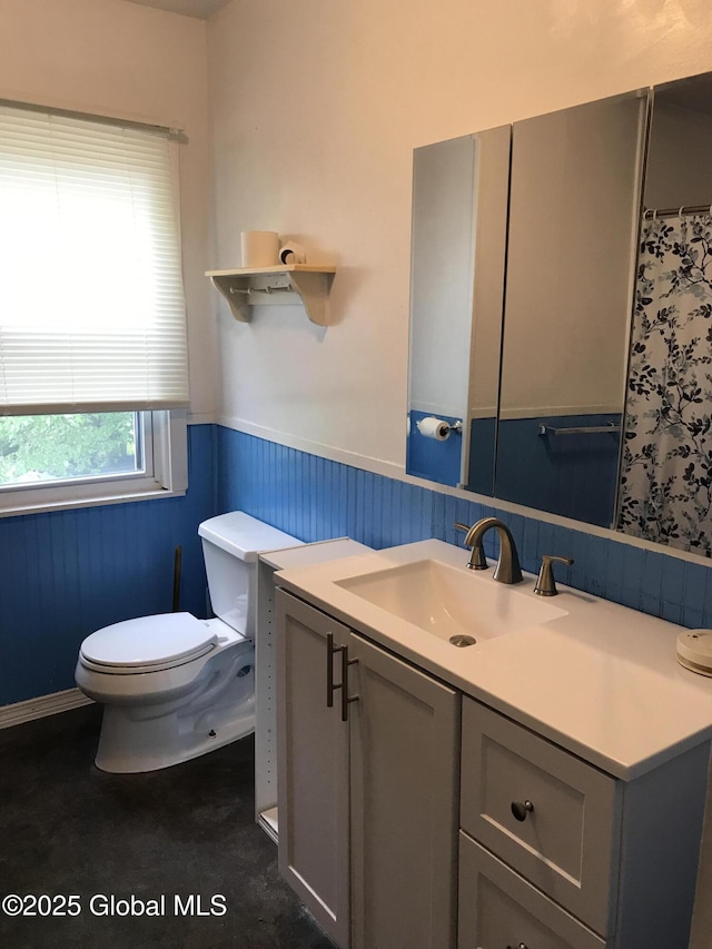 23 Orville St, Glens Falls, NY 12801 - full bath with wainscoting, toilet, and vanity