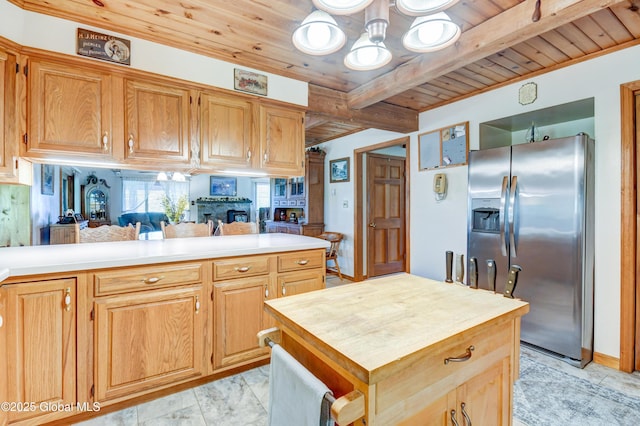 506 Nellis Rd, Palatine, NY 13339 - kitchen with stainless steel refrigerator with ice dispenser, wood ceiling, beamed ceiling, a chandelier, and butcher block counters
