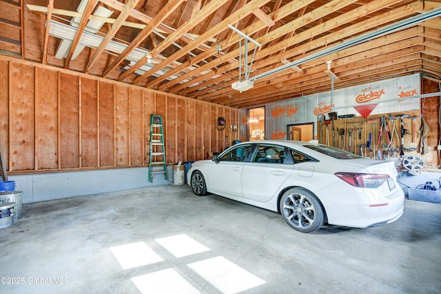 506 Nellis Rd, Palatine, NY 13339 - garage featuring a garage door opener
